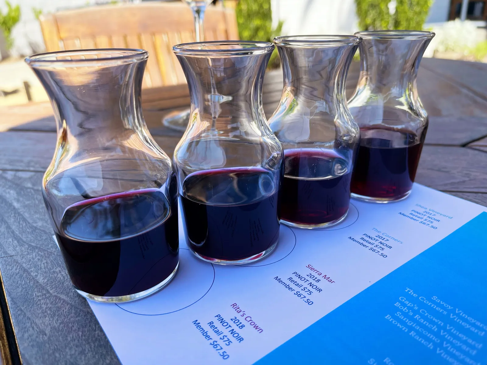 Red wine tasting served in small carafes