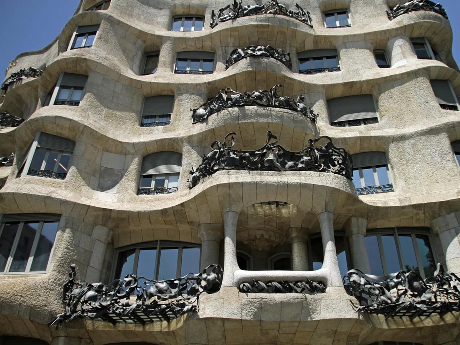 Undulating stone facade of La Pedrera (Casa Milà) by Gaudí in Barcelona