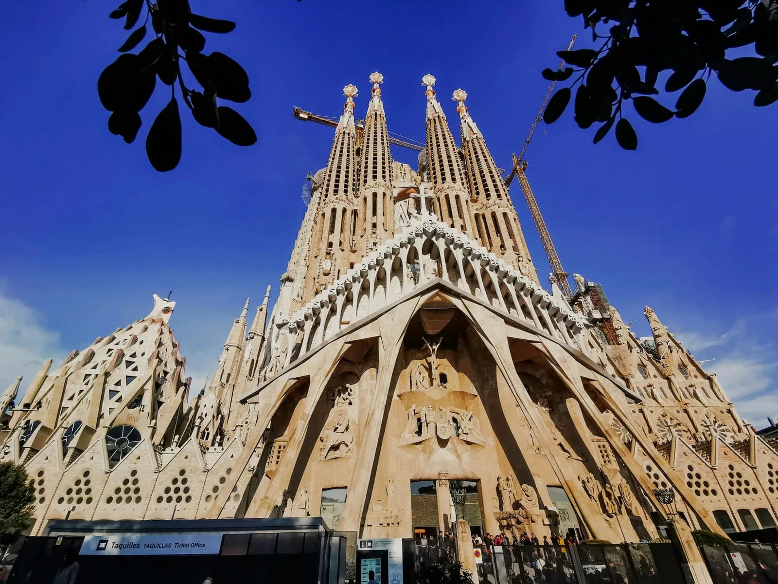 Bustling Barcelona street with colorful buildings and pedestrians