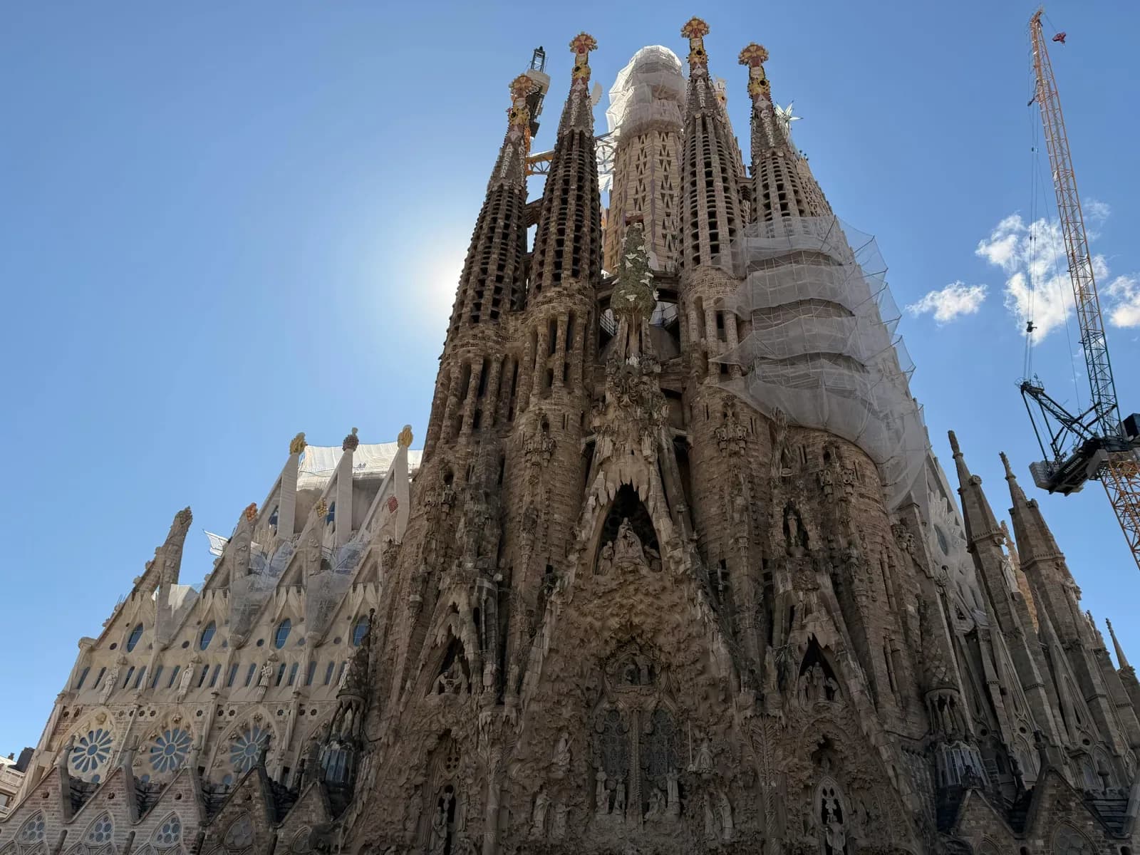 Sagrada Familia basilica front facade with towering spires, Barcelona