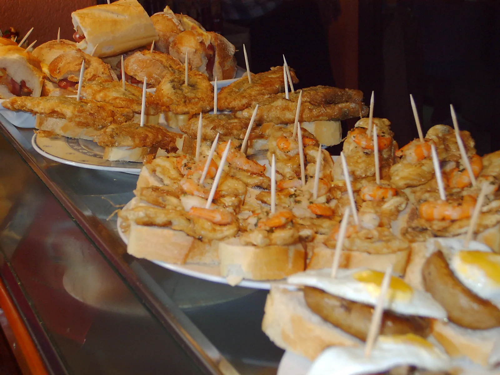 Bar counter full of pintxos in a Basque bar