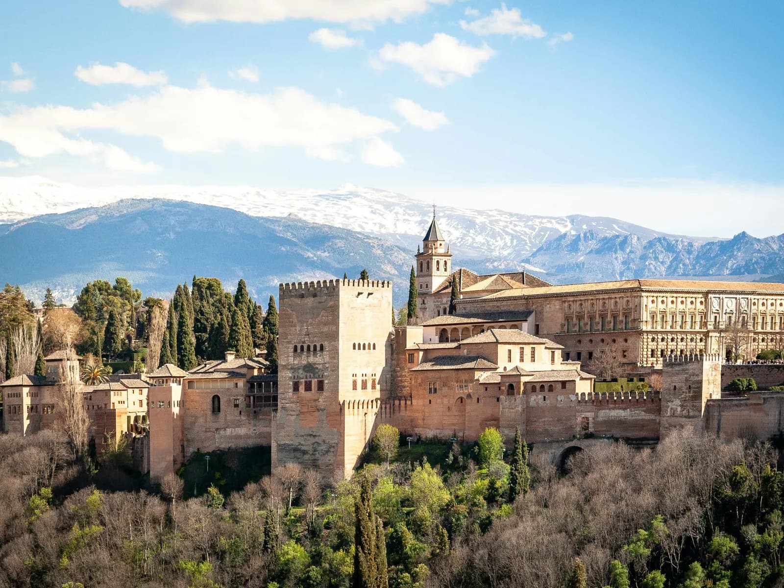 Aerial view of the Alhambra in Granada with the Sierra Nevada behind