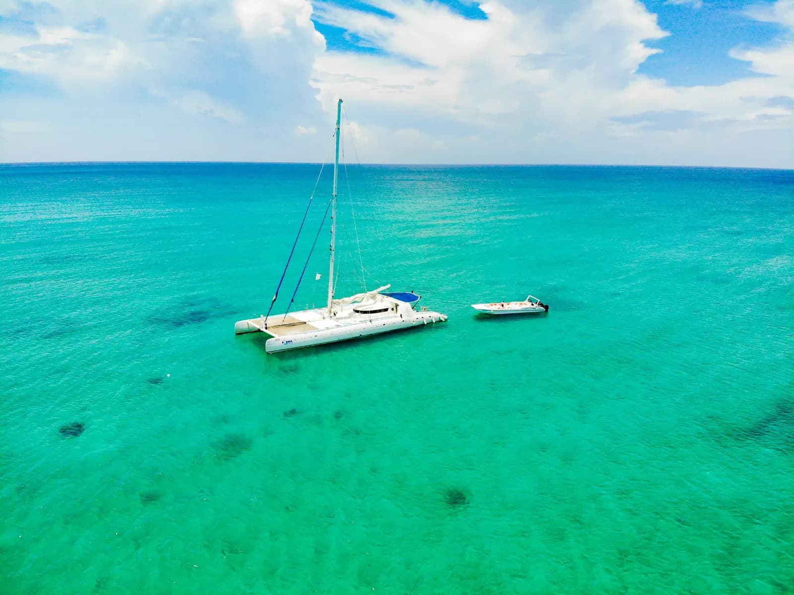 Catamaran anchored in turquoise water