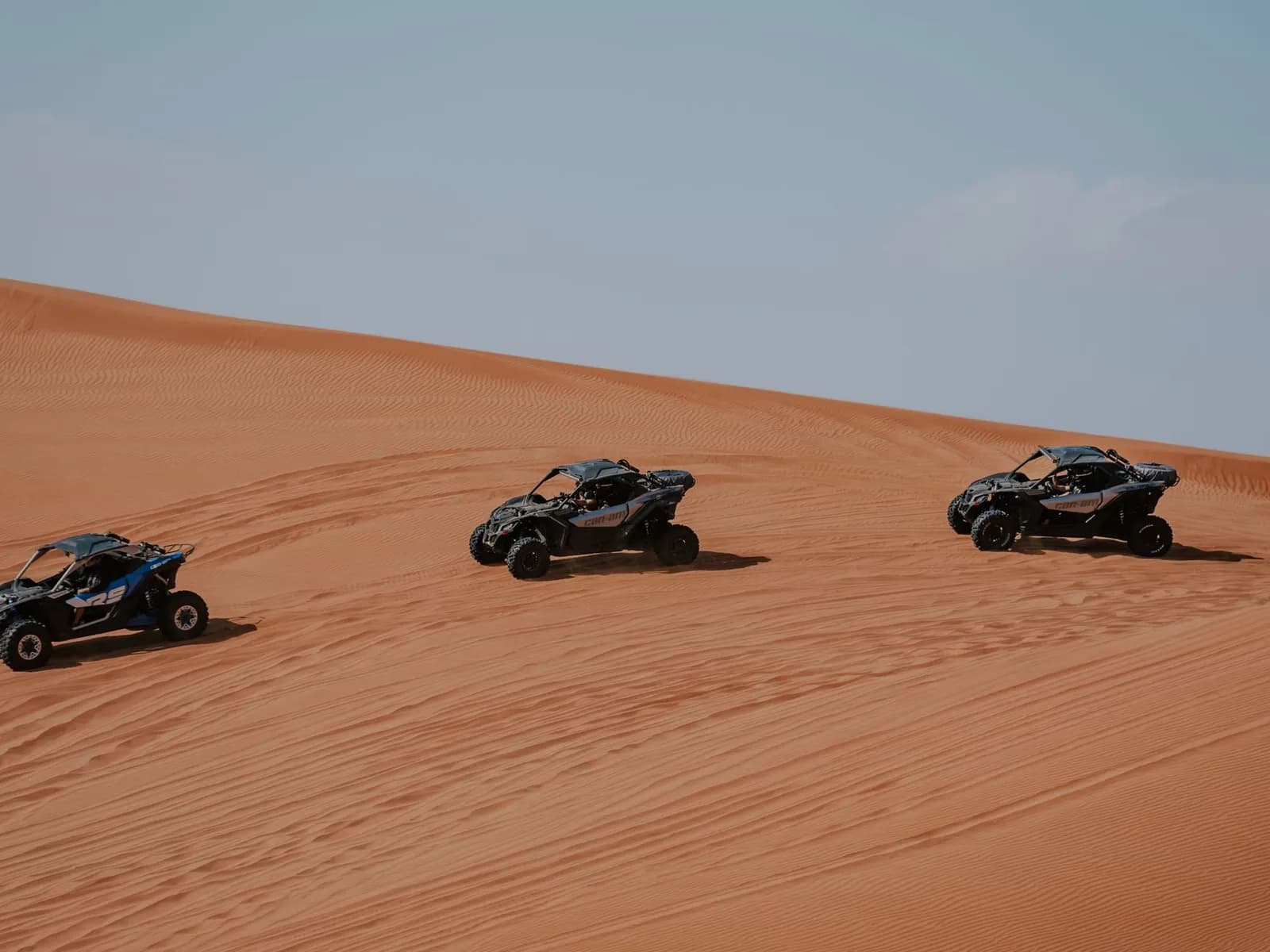 Group of buggies on a sandy track