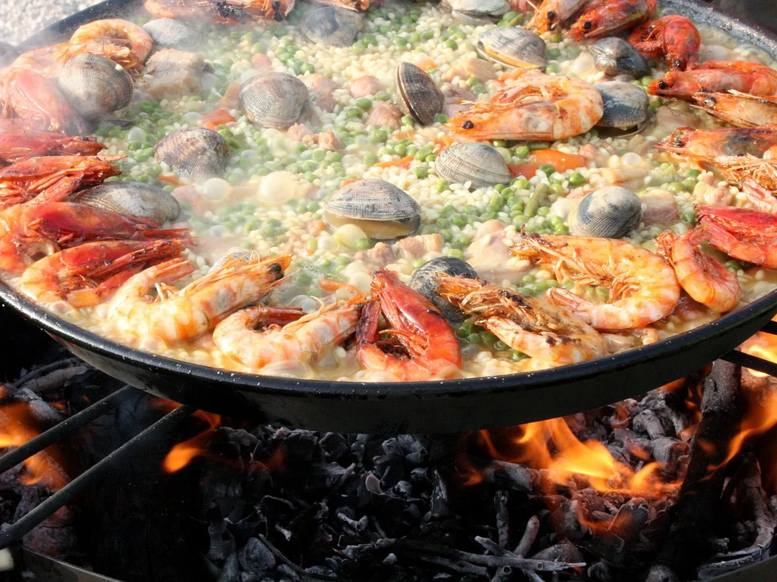 Mixed paella cooked over firewood