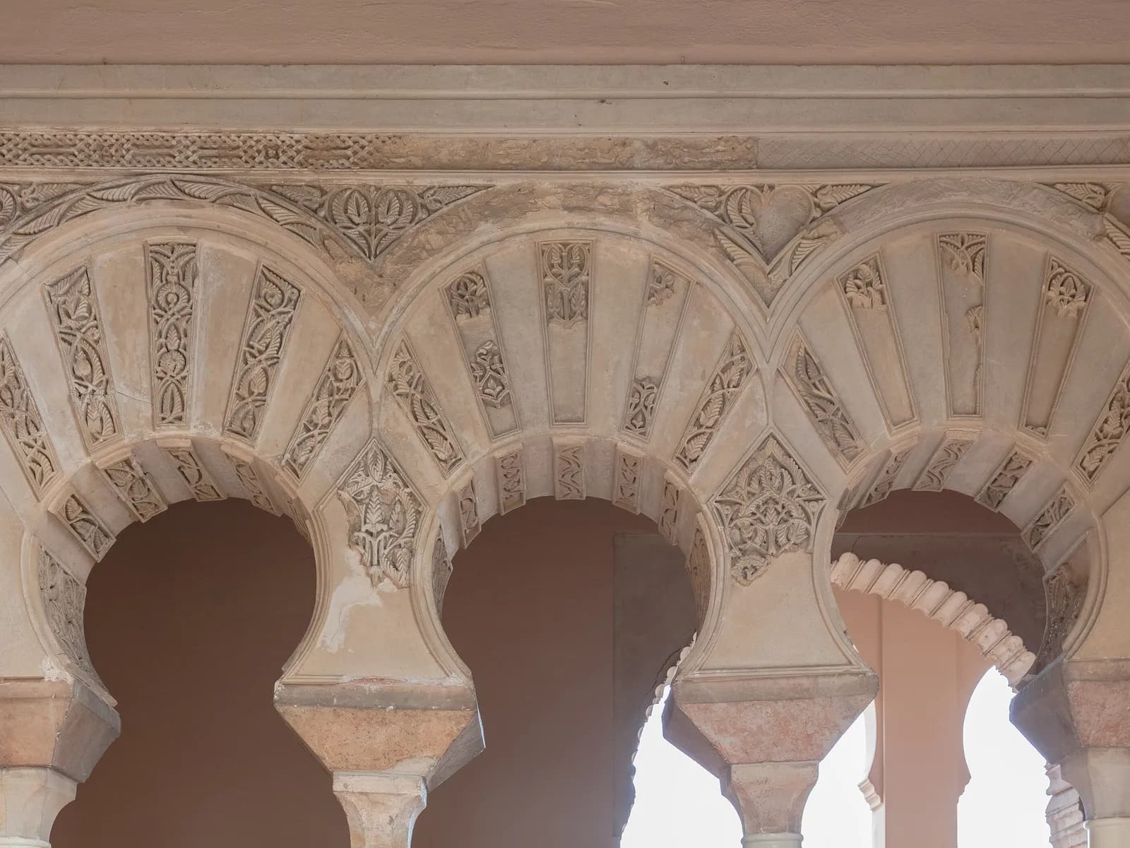 Nasrid-style arches in a courtyard of the Alcazaba of Málaga
