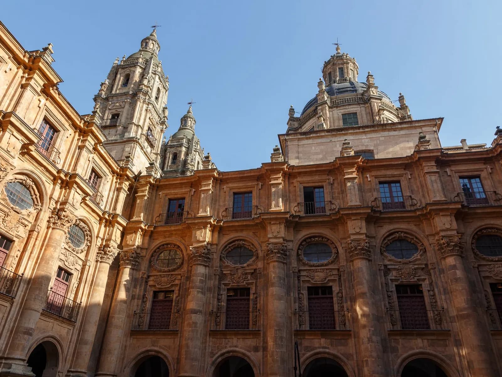 Baroque courtyard of the Clerecía with its towers