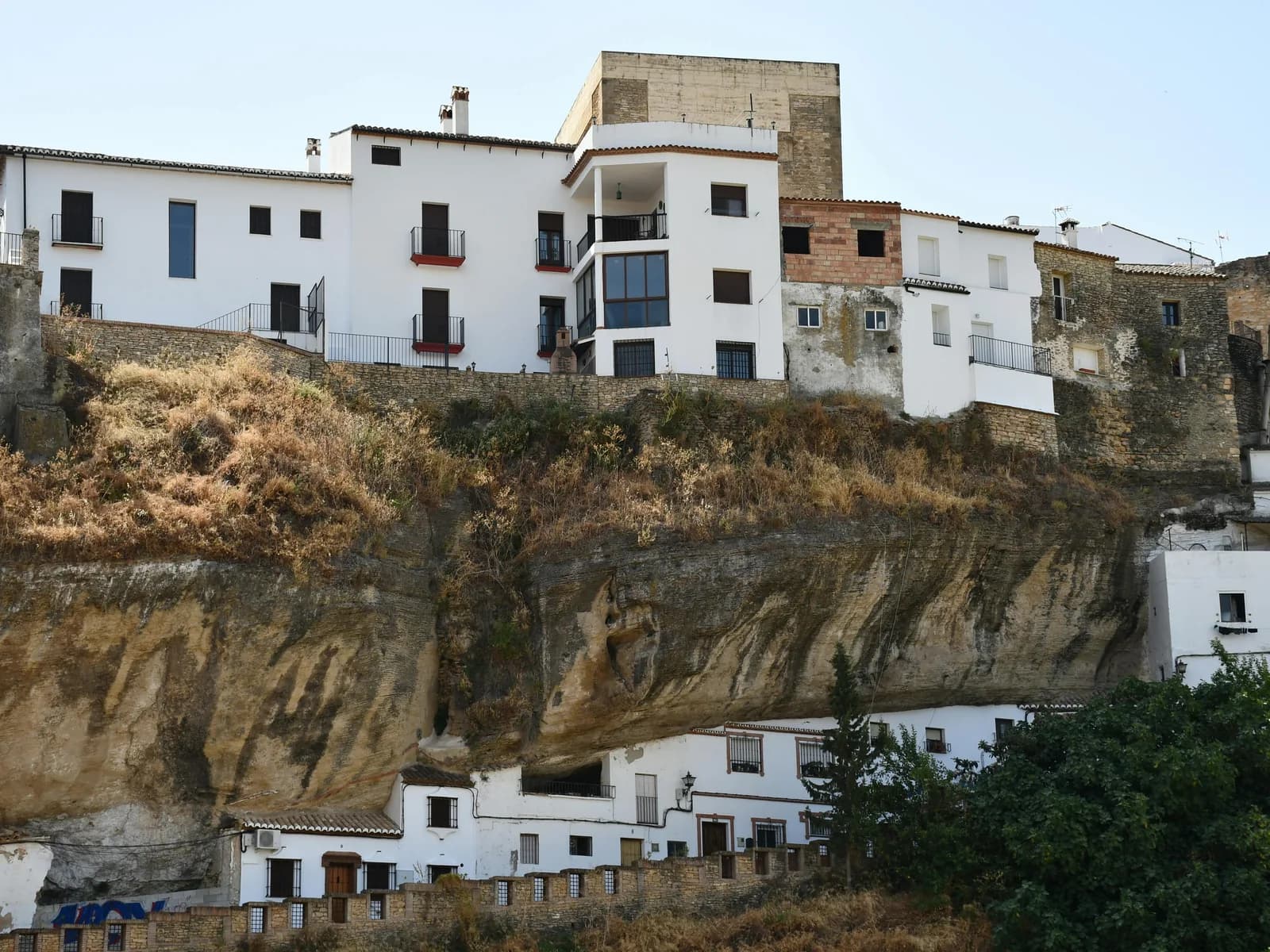 Puente Nuevo of Ronda spanning deep Tajo gorge with three stone arches and dramatic cliff landscape