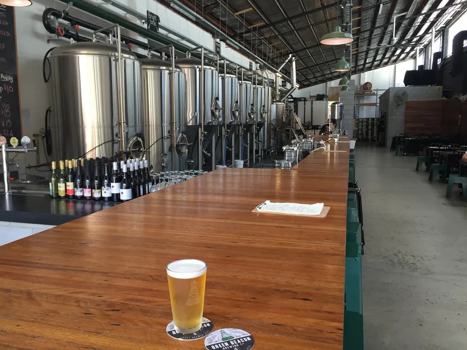 Craft brewery bar with tanks
