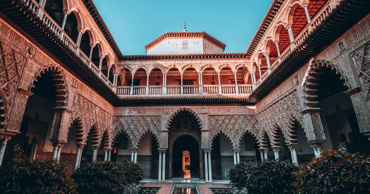 Patio de las Doncellas in the Royal Alcázar of Seville, with its Mudéjar arches and sunken garden