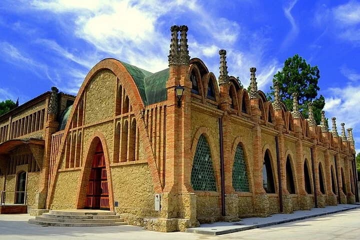 Art Nouveau building of the Codorníu cava cellars under a blue sky