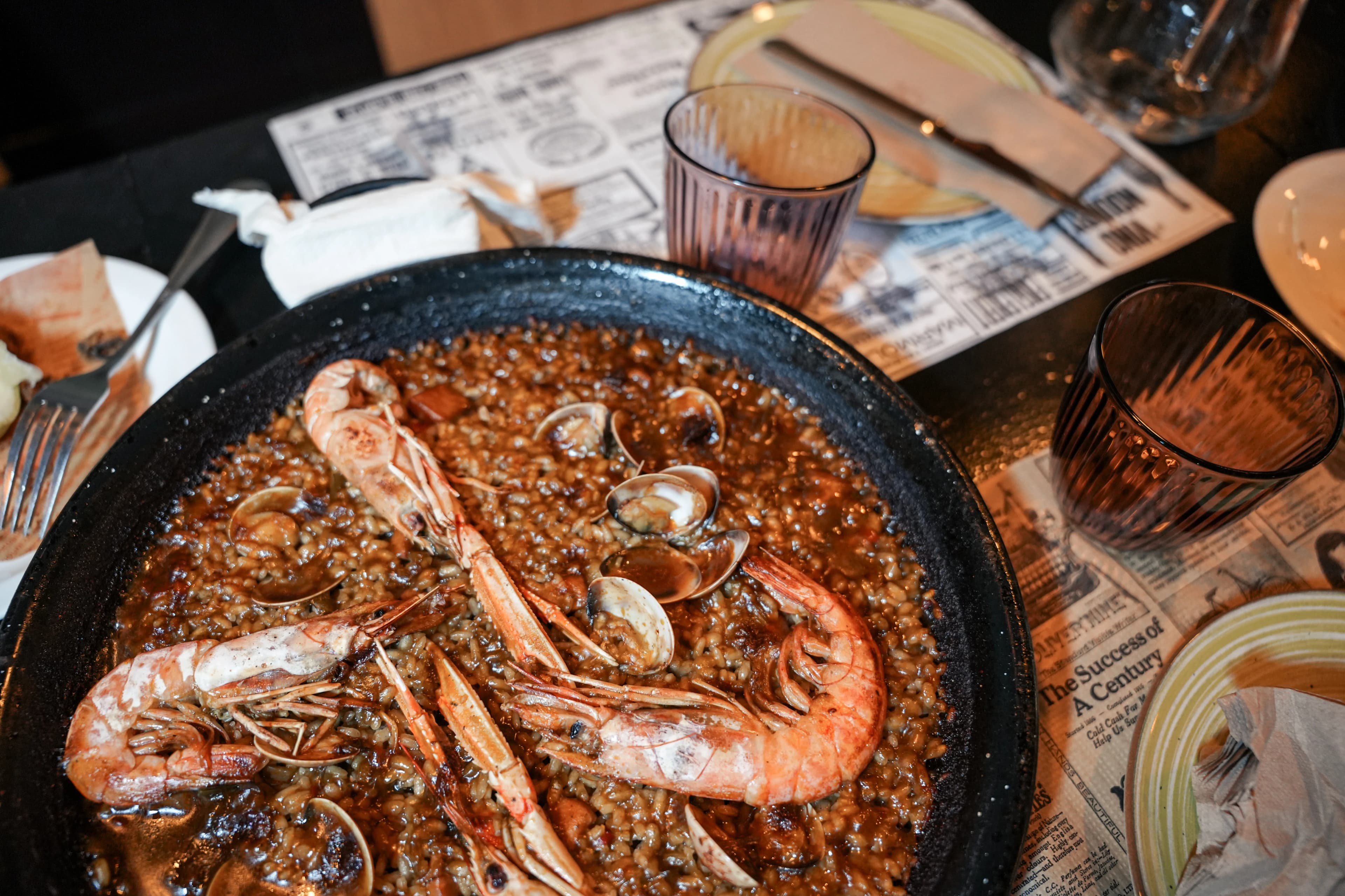 Paella on the table during the tapas tour